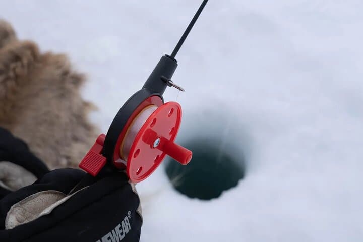Explore Arctic Wilderness: Snowmobile and Icefishing Adventure in Alta photo 6
