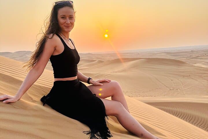 Sunset Red Dunes: Dubai Evening Desert Safari with Camel Ride, Sandboarding & BBQ photo 3