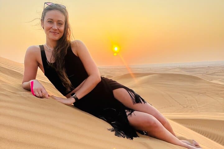 Sunset Red Dunes: Dubai Evening Desert Safari with Camel Ride, Sandboarding & BBQ
