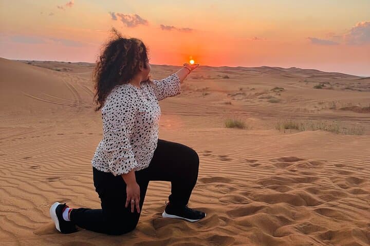 Dubai Red Dune Safari: Camel Ride, Sandboarding & BBQ Sunset Experience photo 6