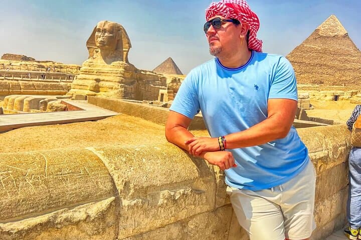 Giza Pyramids Private Guided Tour with Camel Ride & Lunch on a Nile Cruise