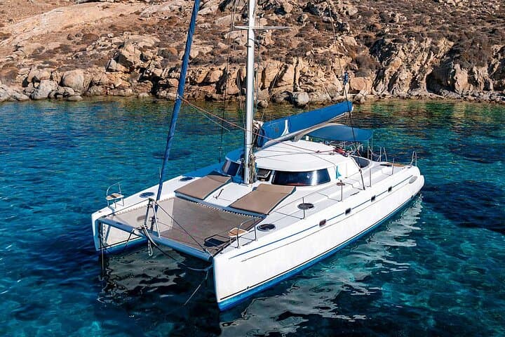 Mykonos Catamaran Private Day Cruise with Full Lunch & Open Bar to Rhenia and South Beaches photo 3