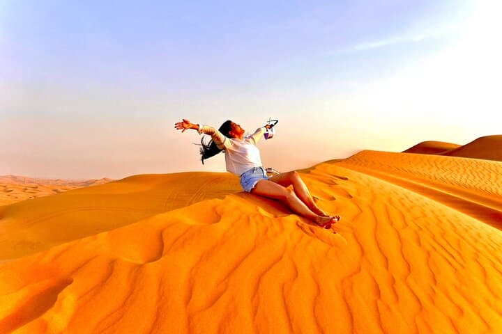 Dubai Desert Safari: Dune Bashing, Camel Ride & Sunset BBQ Experience photo 4