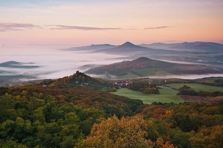 Bohemian Highlands 4x4 Winter Tour from Prague — Castles, Vineyards & Farm Visits photo 1
