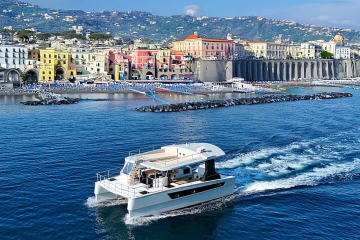 Capri Catamaran Private Boat Tour: Blue Grotto, Faraglioni & Hidden Coves