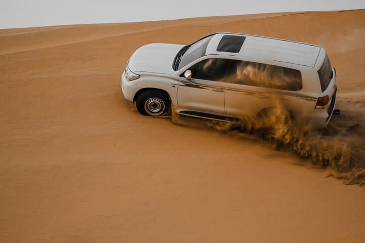 Doha Desert Safari: Quad Bike, Dune Drive & Camel Ride Experience photo 3