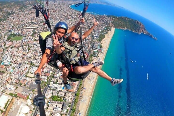 Tandem Paragliding over Cleopatra Beach — Yassı Tepe Takeoff with Hotel Transfer