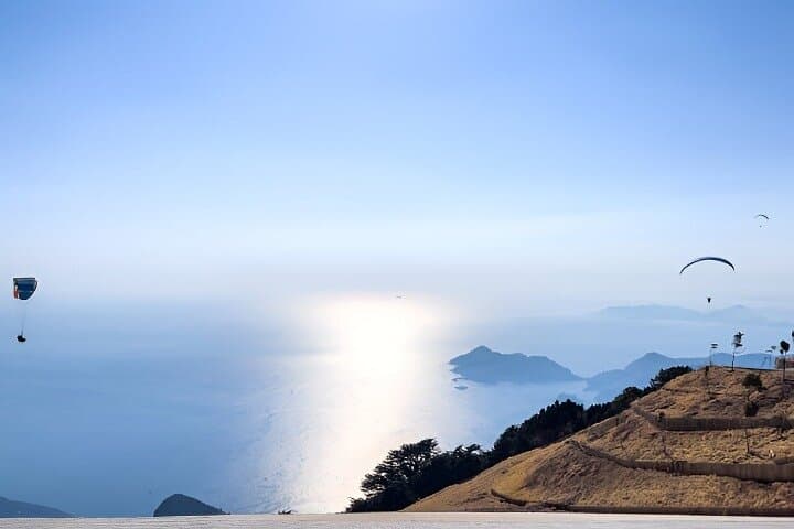 Tandem Paragliding over Cleopatra Beach — Yassı Tepe Takeoff with Hotel Transfer photo 6
