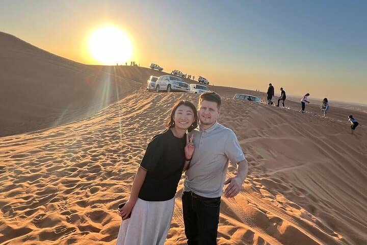 Dubai Desert Safari: Quad Bike, Sandboarding, Camel Ride & BBQ Experience photo 5
