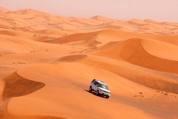 Dubai Desert Safari with BBQ Dinner: Dune Bashing, ATV & Evening Camp Experience photo 4
