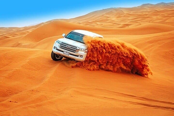 Dubai Desert Safari with BBQ Dinner: Dune Bashing, ATV & Evening Camp Experience