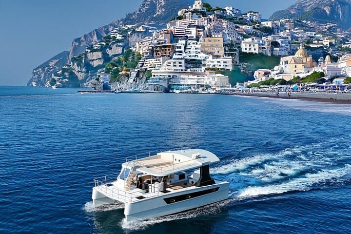 Capri Catamaran Private Boat Tour: Blue Grotto, Faraglioni & Hidden Coves photo 4