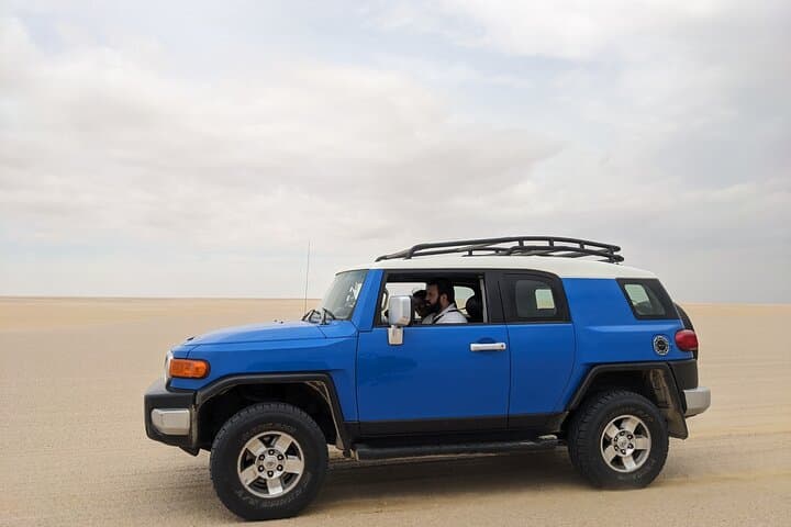 Full-Day Wadi El Rayan & Wadi El Hiten Tour from Cairo — Waterfalls, Fossils & Sandboarding