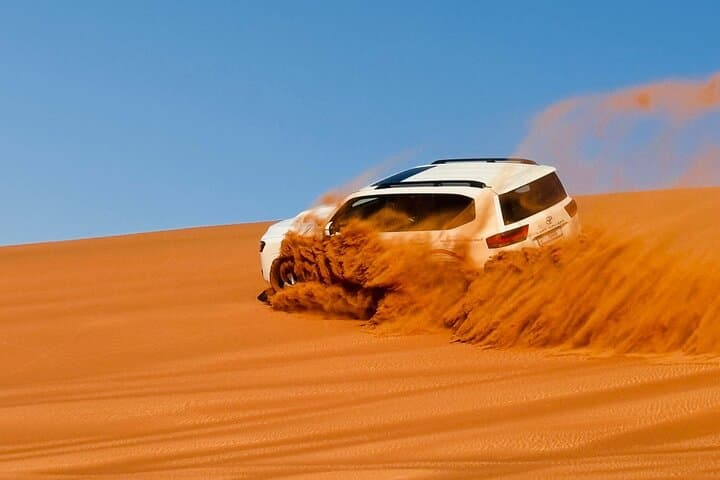 Evening Dubai Desert Safari: Dune Bashing, Camel Rides & Bedouin Camp Experience photo 3