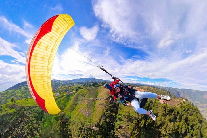 Tandem Paragliding Over Medellín — 15-Minute Flight with Transport photo 6