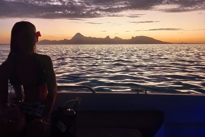 Sunset Cruise in Tahiti: Lagoon Swim & Moorea Views at Dusk photo 1