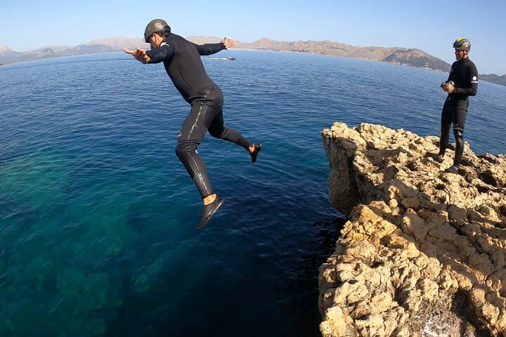 Alcudia Coasteering: Cliff Jumps, Caves & Snorkel Adventure in Mallorca