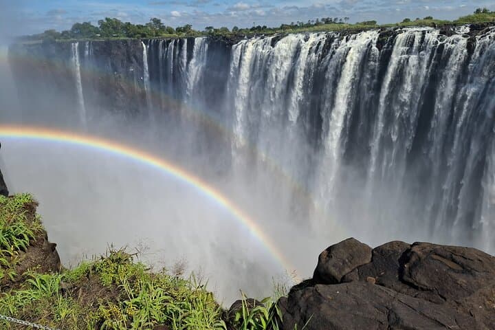Spanish-Guided Victoria Falls & Chobe Safari — Falls Walk, Boat Cruise and 4x4 photo 1