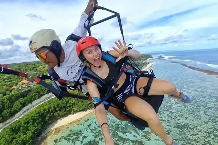 Manado paragliding and rafting day trip with lunch and pickup photo 2