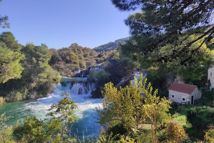 Experience Krka Waterfalls: A Day Tour from Split with Scenic Boat and Swimming photo 4
