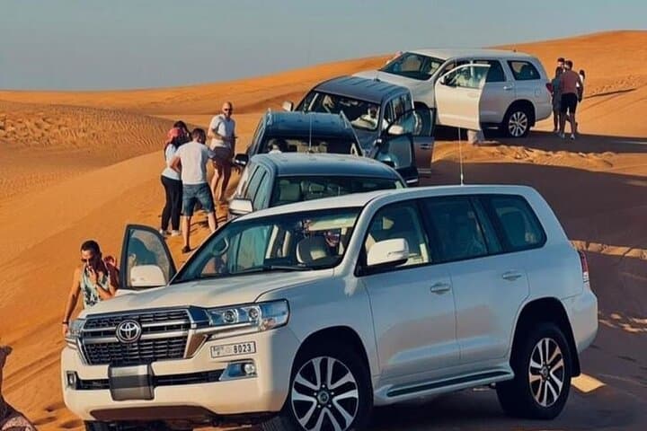 Abu Dhabi Desert Safari: Evening Dune Bash, Camel Ride & BBQ Experience