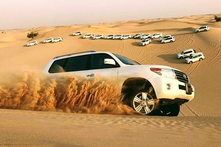 Abu Dhabi Desert Safari: Evening Dune Bash, Camel Ride & BBQ Experience photo 6