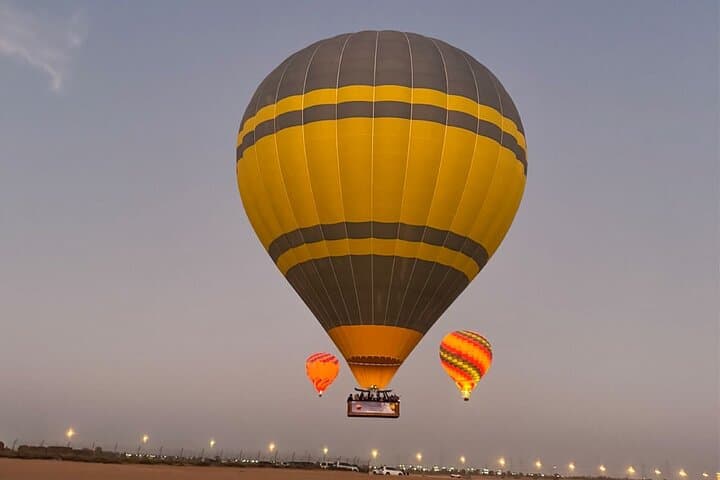 Dawn Over the Dunes: Hot Air Balloon Ride in Dubai photo 5