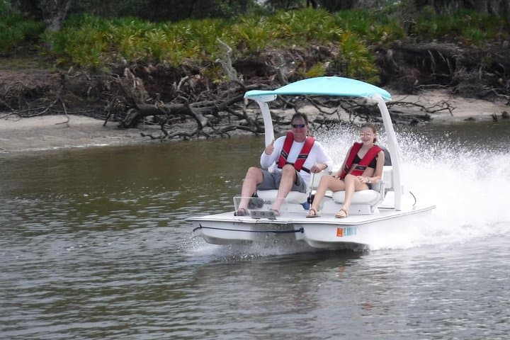Drive a 2‑Person Go Cat Boat Through Naples Bay and the 10,000 Islands photo 1