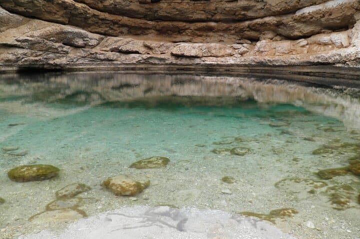 Wadi Shab & Bimmah Sinkhole Private Tour from Muscat: Hike, Swim, and Cave Waterfall Adventure
