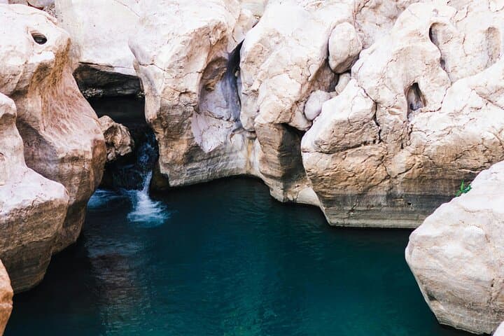 Wadi Shab & Bimmah Sinkhole Private Tour from Muscat: Hike, Swim, and Cave Waterfall Adventure photo 6