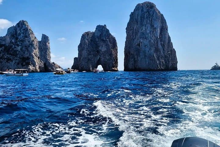 Private Boat Tour from Positano to Capri — Blue Grotto, Faraglioni & Li Galli photo 4