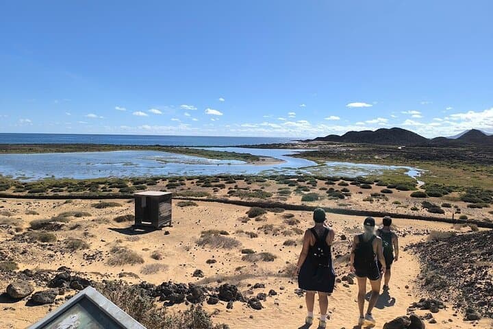 Hiking Isla de Lobos: Volcano Ridge, Roman Ruins & Natural Pools from Corralejo