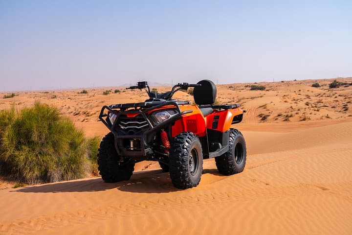 Dubai Desert Quad Bike and Camel Ride — 4–5 Hour Private Red Dunes Adventure photo 1