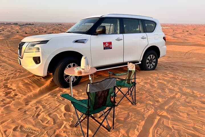 Sunrise Dubai Desert Safari: Private 4–5 Hour Dune Drive, Camel Ride & Sandboarding photo 1