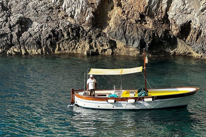 Coastal Circumnavigation: Private 4-Hour Capri Boat Tour with Swims & Grottos