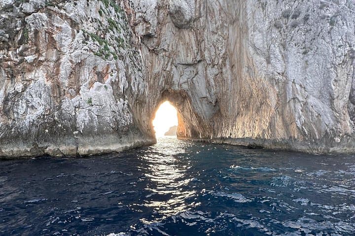 Coastal Circumnavigation: Private 4-Hour Capri Boat Tour with Swims & Grottos photo 3