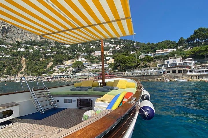 Coastal Circumnavigation: Private 4-Hour Capri Boat Tour with Swims & Grottos photo 4
