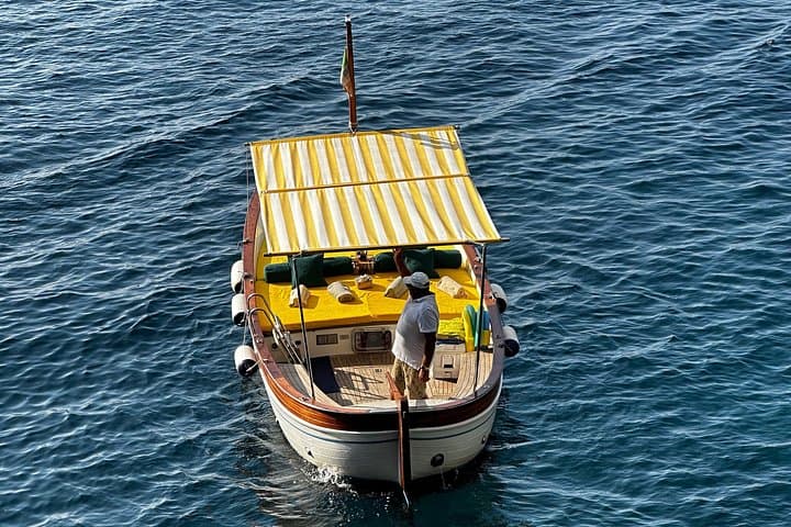 Coastal Circumnavigation: Private 4-Hour Capri Boat Tour with Swims & Grottos photo 6