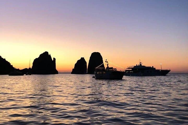 Capri at Sunset: Faraglioni Grotto Boat Tour with Prosecco & Optional Snorkel photo 2