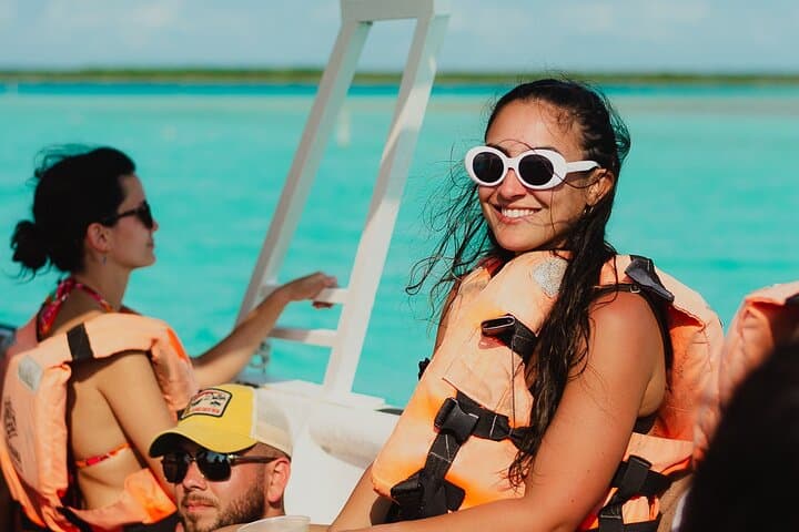 Bacalar Lagoon Boat Tour: Swim Cenotes, See Stromatolites & Sunset Open Bar photo 2