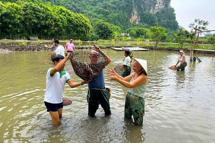 Ninh Binh Motorbike Day Tour: Ride Tam Coc Rice Fields & Hidden Cave Temples photo 3