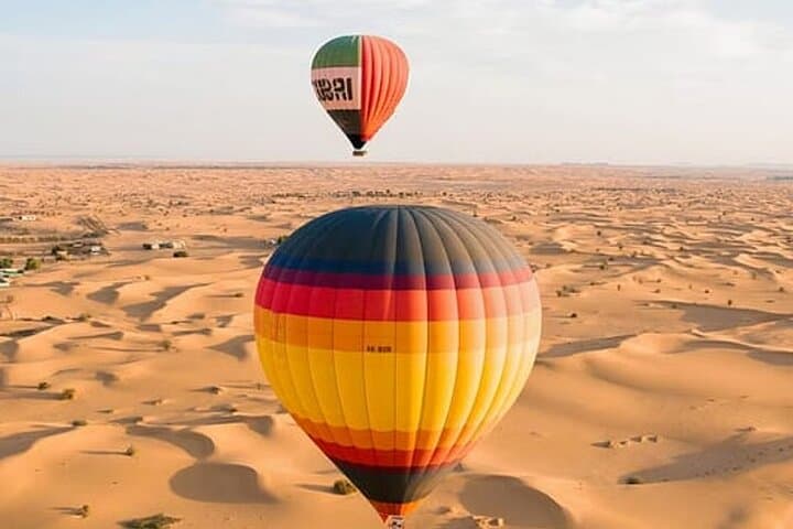 Dawn Over the Dunes: Hot Air Balloon Ride in Dubai photo 2