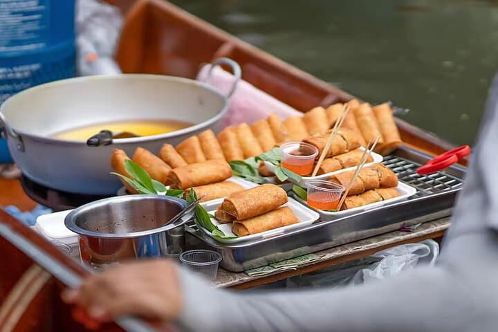 Bangkok Canal Cruise: Damnoen Saduak Floating Market & Maeklong Railway Market Day Tour photo 6