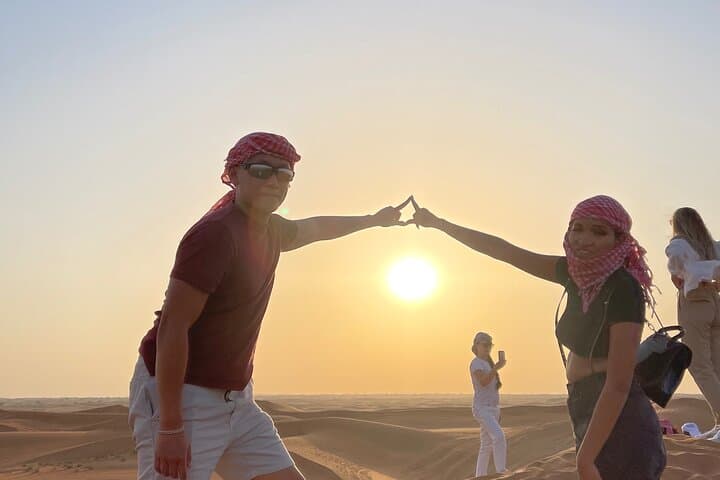 Morning Dune Safari, Sandboarding & Camel Ride in Dubai Desert photo 2