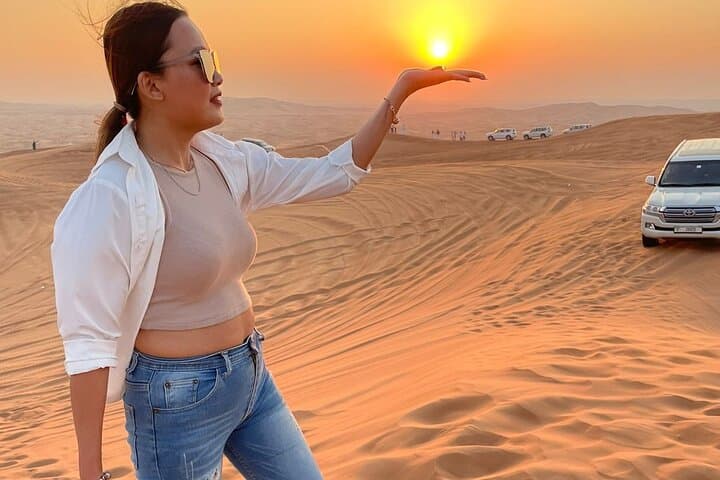 Dubai Evening Desert Safari with Camel Ride, Sandboarding & BBQ photo 4