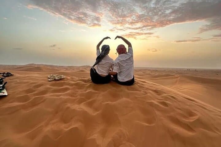 Private Morning Safari Dubai: Sunrise Dune Bashing, Camel Rides & Sandboarding photo 2