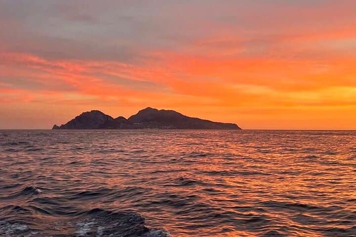 Capri Sunset Boat Experience — Prosecco, Night Snorkel & Faraglioni Views