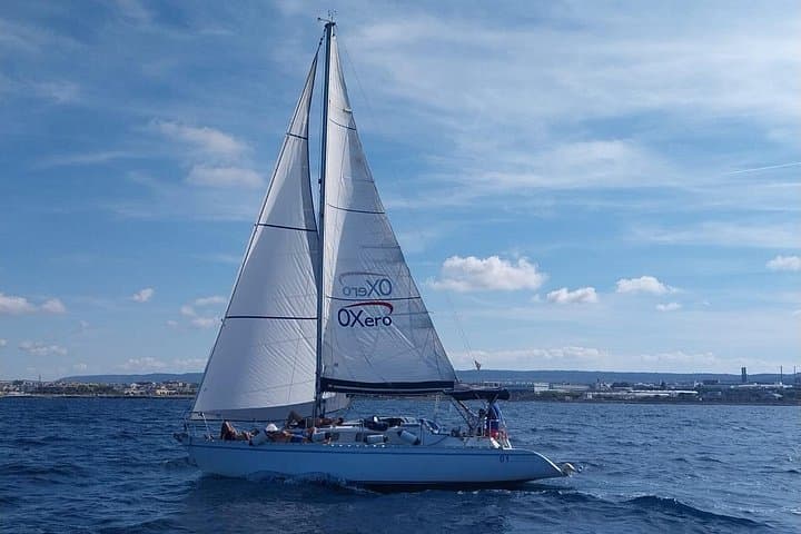 Sailing the Cliffs of Polignano a Mare: Group Boat Tour & Swim with Aperitivo photo 1