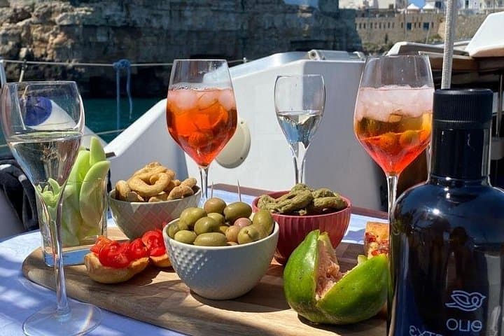 Sailing the Cliffs of Polignano a Mare: Group Boat Tour & Swim with Aperitivo photo 2