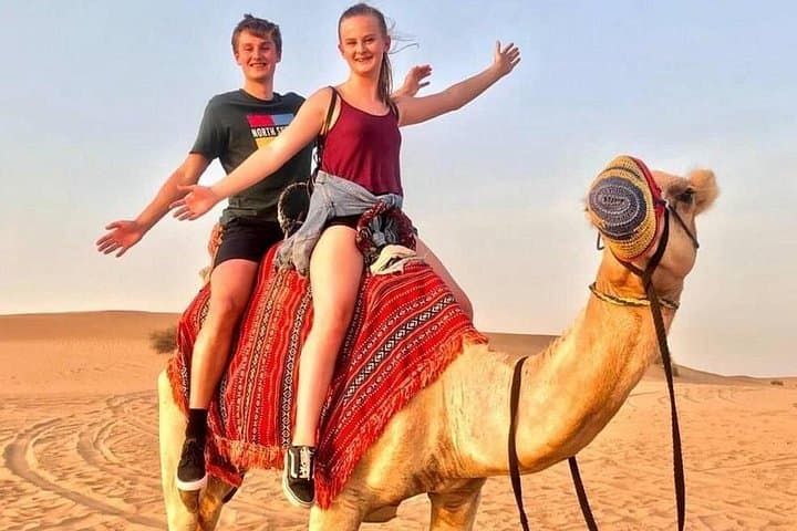 Sunrise Desert Safari Dubai: Private Morning 4x4 Dune Drive, Camel Ride & Sandboarding photo 2
